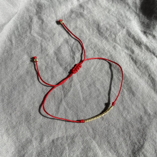 Red string bracelet